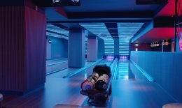 Neon-lit bowling alley