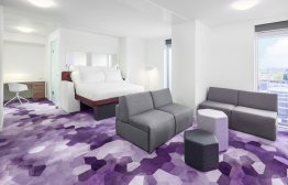 YOTEL Amsterdam - VIP Junior Suite - bedroom and lounge