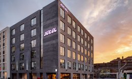 YOTEL London shoreditch exterior with purple sign