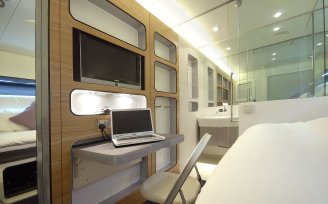 YOTELAIR Premium Cabin with laptop white