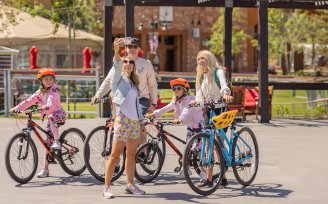 YOTELPAD Park City - Family taking a selfie on bicycles