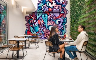 YOTEL Porto - Ground floor patio with iconic graffiti wall art