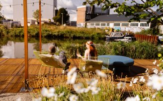 Couple on canalside terrace