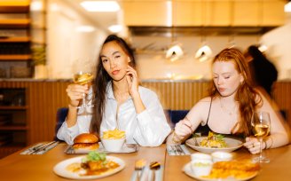 Girls eating at table 