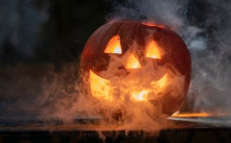 Carved pumpkin with smoke