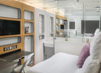 YOTELAIR Premium Cabin with pullout desk