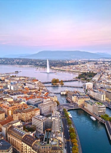 An Ariel view of Geneva and Geneva Lake with the alps in the background