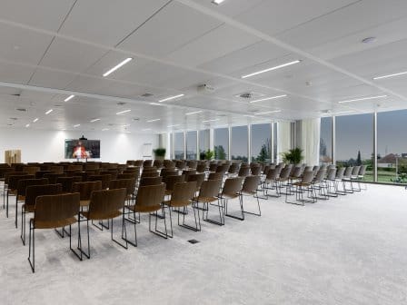Empty meeting room set up in theatre style