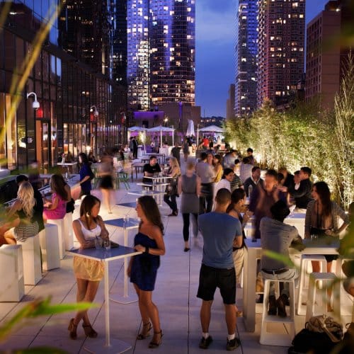 A large event on a rooftop bar in New York City