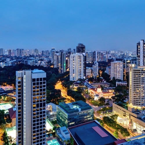 Sweeping views of the Singapore skyline at dusk taken from a high-rise hotel