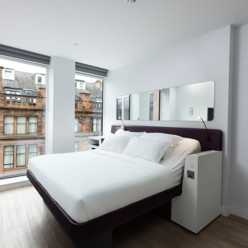 First class hotel room with large windows