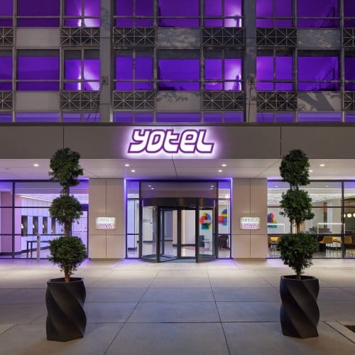 The facade of a modern hotel at night 