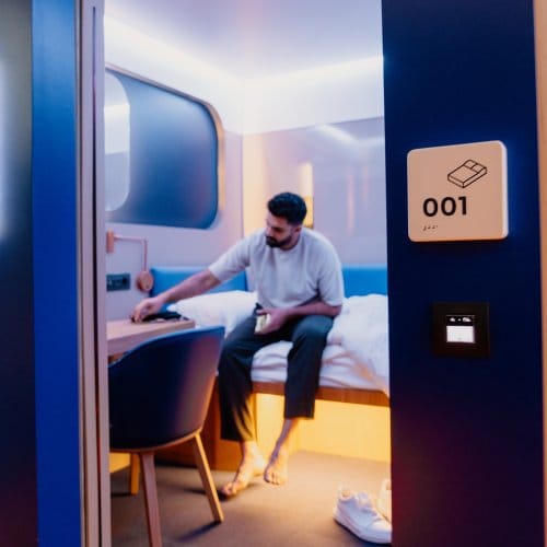 A man relaxes in cabin 001