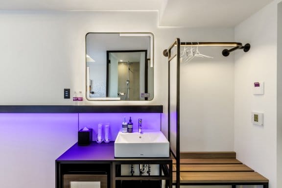basin and open wardrobe 
