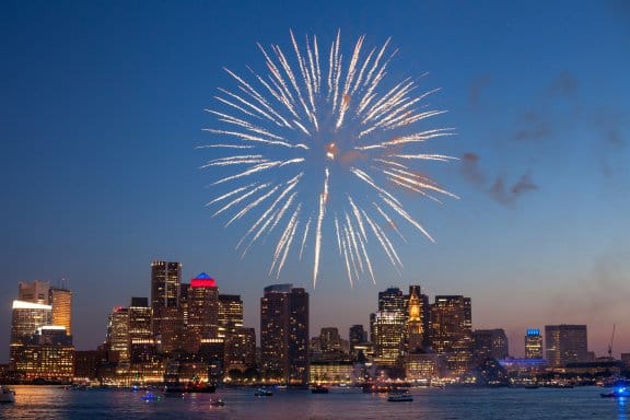 A fireworks display over the Boston skyline