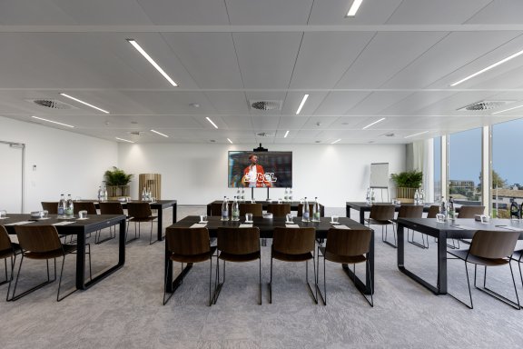 Empty meeting room set up in classroom style