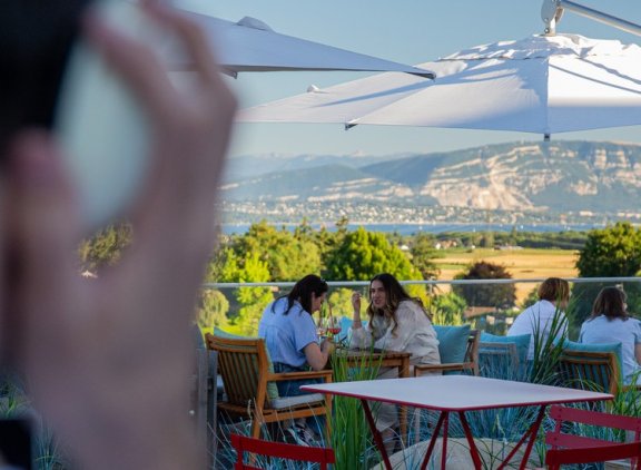 Rooftop with DJ and people socialising