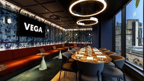 Sleek meeting room space with views of the city