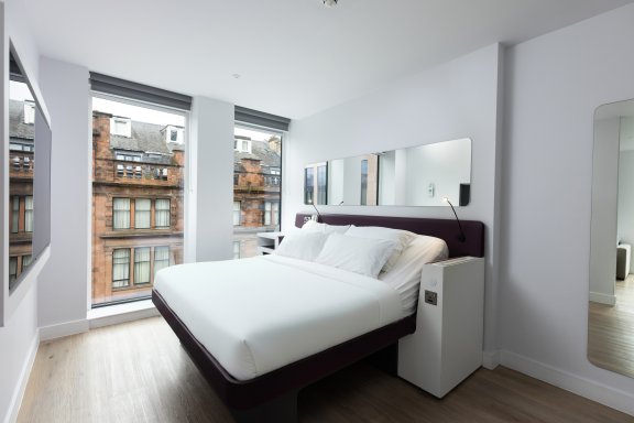 First class hotel room with large windows