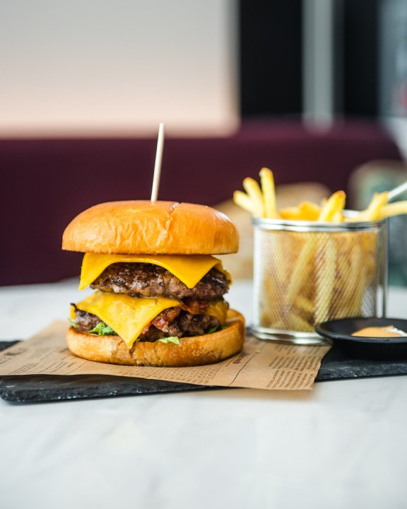 Burger and fries on a table