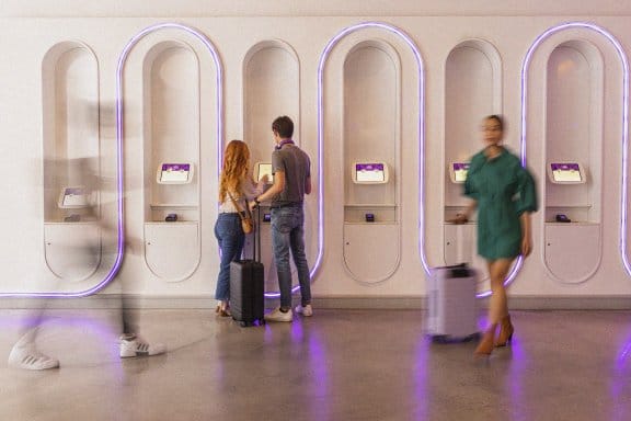 A couple check-in at a modern hotel reception
