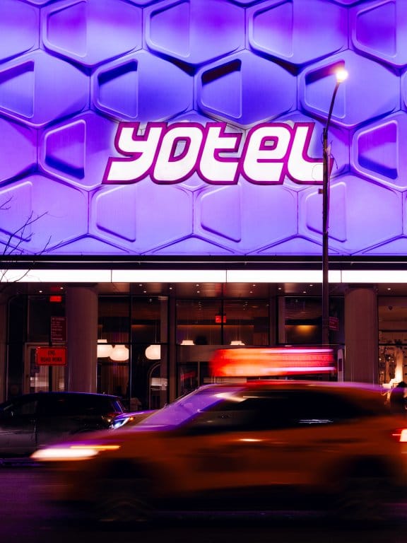 A vibrant exterior scene in New York by YOTEL