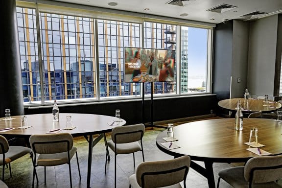 A large meeting space with big windows