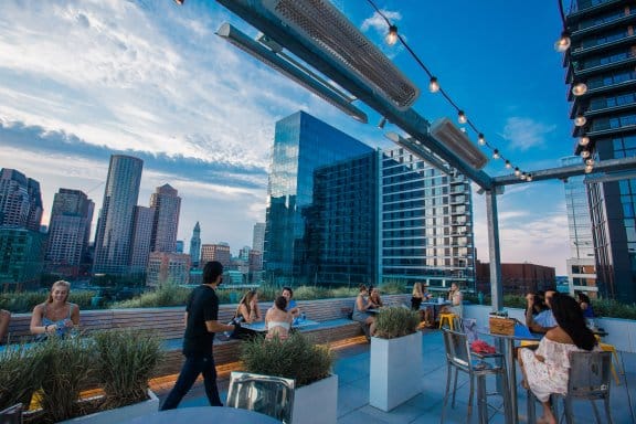 A clear dusk and a rooftop bar