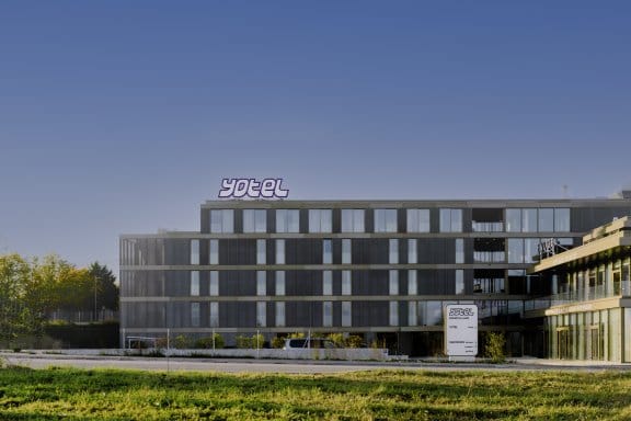 The outside of a modern hotel in the countryside
