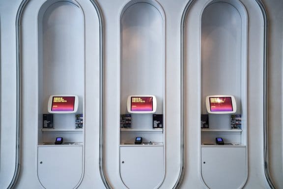 Three self check-in kiosks