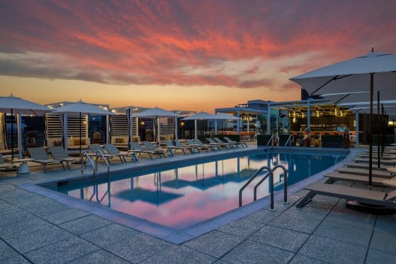 A rooftop pool at night
