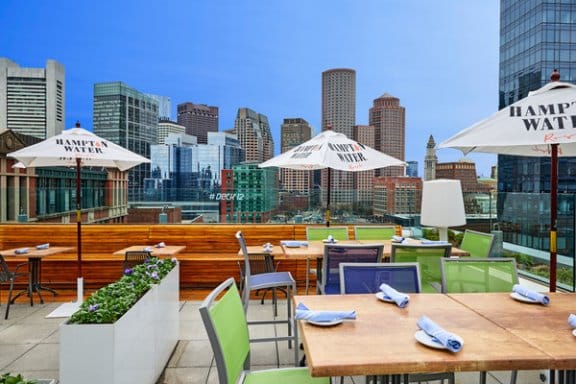 A rooftop bar and restaurant on a sunny day