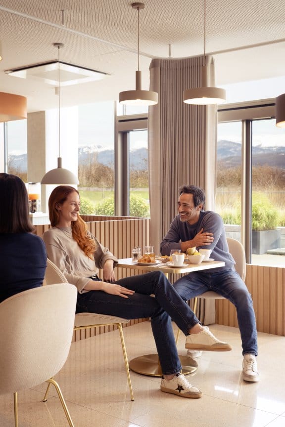 A couple enjoy snacks at a cafe restaurant