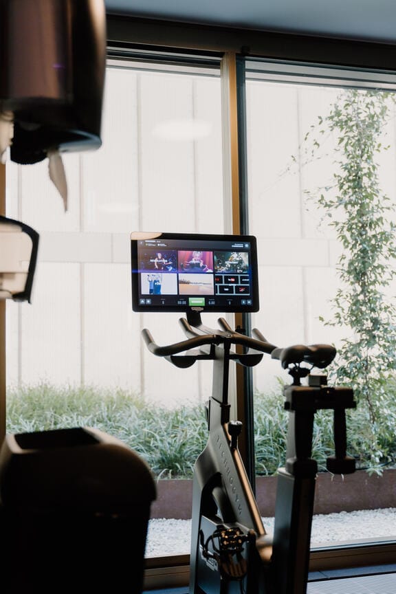 A modern exercise bike in a hotel gym