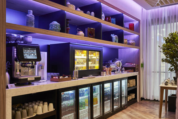YOTEL Istanbul Airside Hotel's Grab and Go station with fridges full of drinks and snacks