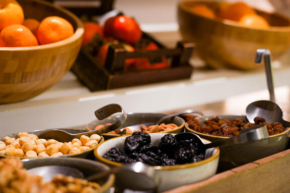 YOTEL Istanbul Landside continental style buffet breakfast with fresh and dried fruit on display
