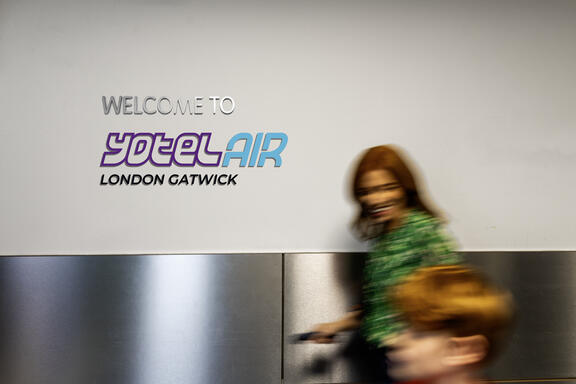 YOTELAir London Gatwick entrance with mother and son