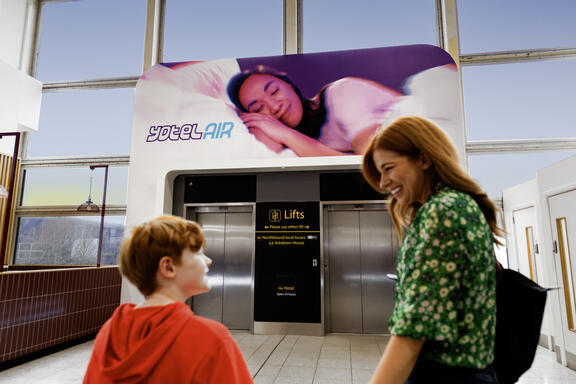 YOTELAir London Gatwick entrance with mother and son ready to go inside