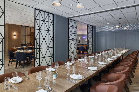 YOTEL Washington DC Art and Soul restaurant with large private group table setting for over 20 people