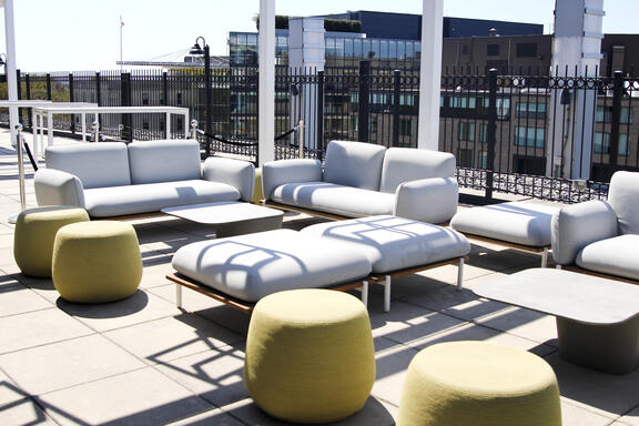Comfortable sofas and stools line the pool at YOTEL Washington DC