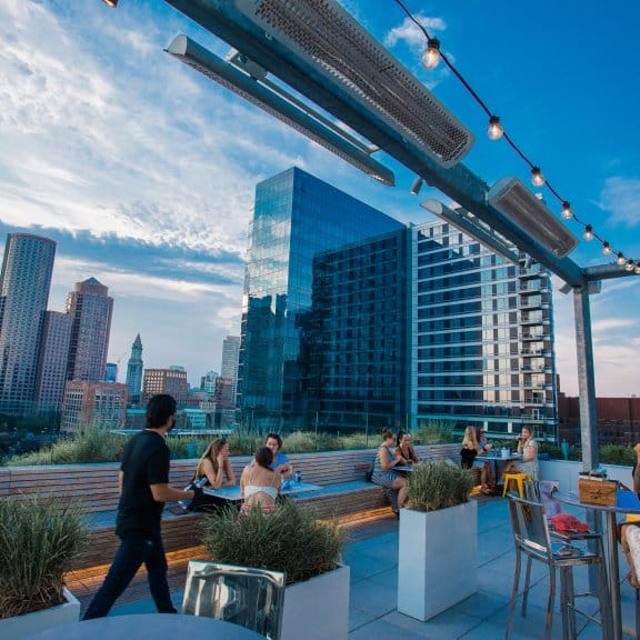 A clear dusk and a rooftop bar