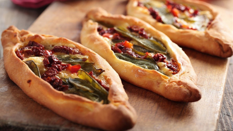 Istanbul pide dish on chopping board