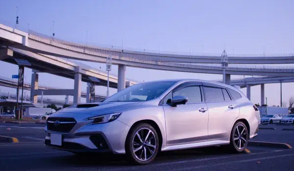 A car infront of crossing roads