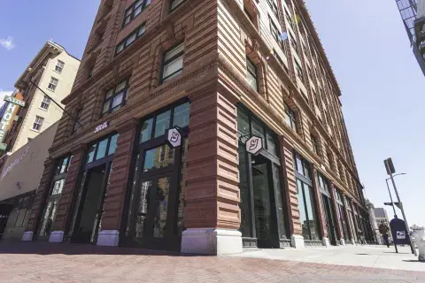 The front entrance to a picturesque old building. It's YOTEL San Francisco!