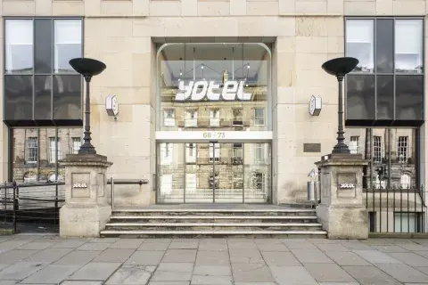 The glass front entrance to YOTEL Edinburgh